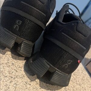 On Running All-Black Athletic Shoes